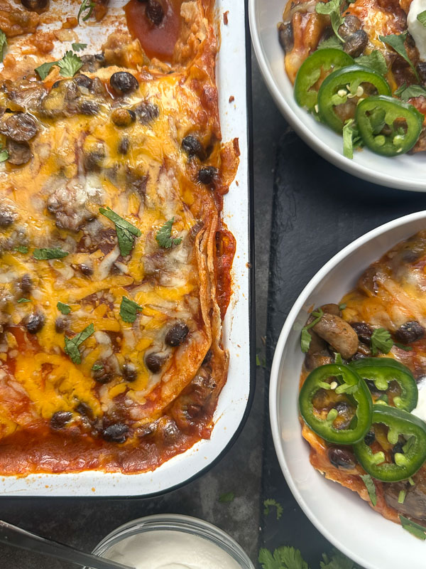 Looking for a delicious meatless meal? This Mushroom Enchilada Casserole is packed with savory mushrooms, cheesy goodness, and bold enchilada sauce. Perfect for weeknight dinners or meal prep! #VegetarianRecipe #EnchiladaCasserole #MushroomRecipes #EasyDinner #MeatlessMonday #Shutterbean