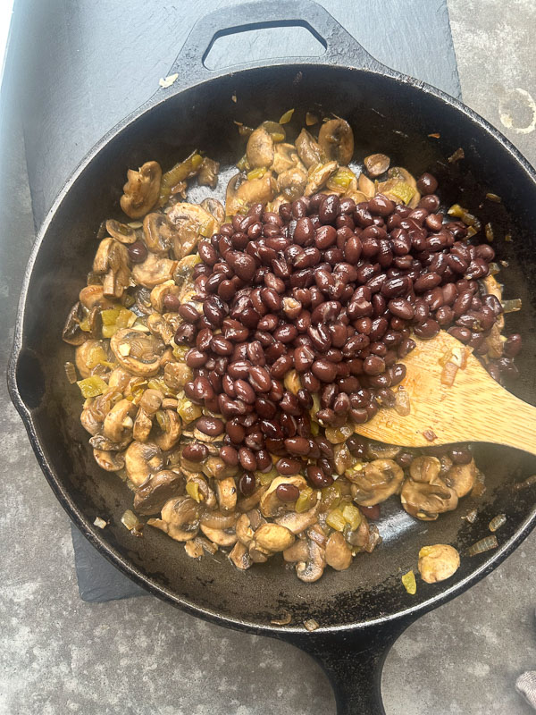 Looking for a delicious meatless meal? This Mushroom Enchilada Casserole is packed with savory mushrooms, cheesy goodness, and bold enchilada sauce. Perfect for weeknight dinners or meal prep! #VegetarianRecipe #EnchiladaCasserole #MushroomRecipes #EasyDinner #MeatlessMonday #Shutterbean