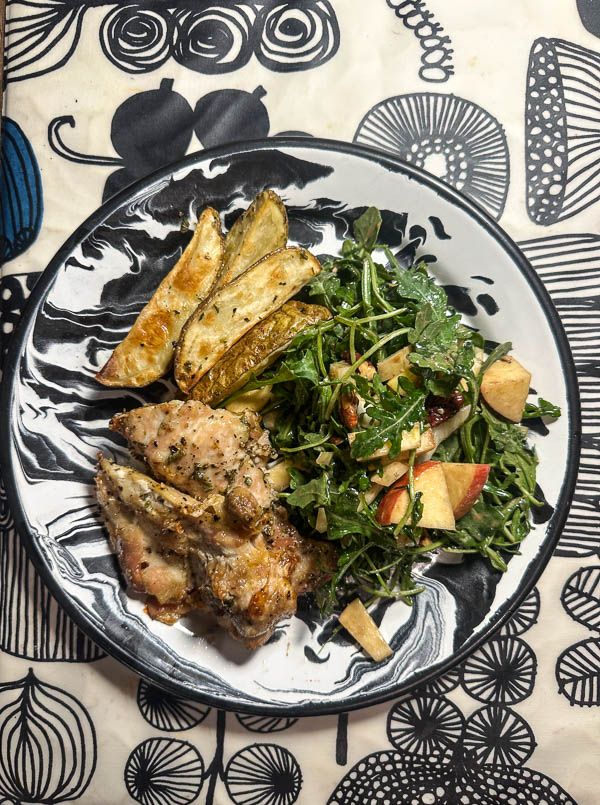 Sol Food Chicken, roasted potatoes, arugula salad with blue cheese and apples. 